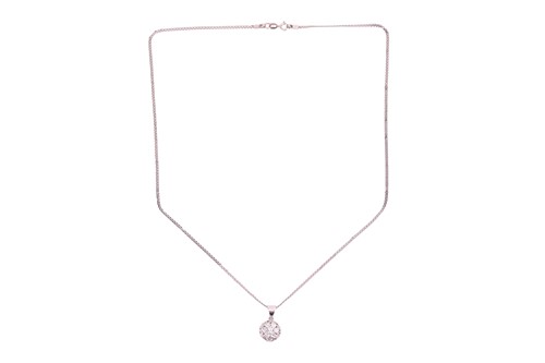 Lot A diamond pendant and earring set, the pendant...