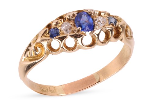 Lot 17 - A sapphire and diamond half-hoop ring in 18ct...