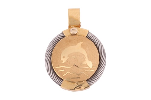 Lot 70 - A two-toned pendant, depicting a dolphin...