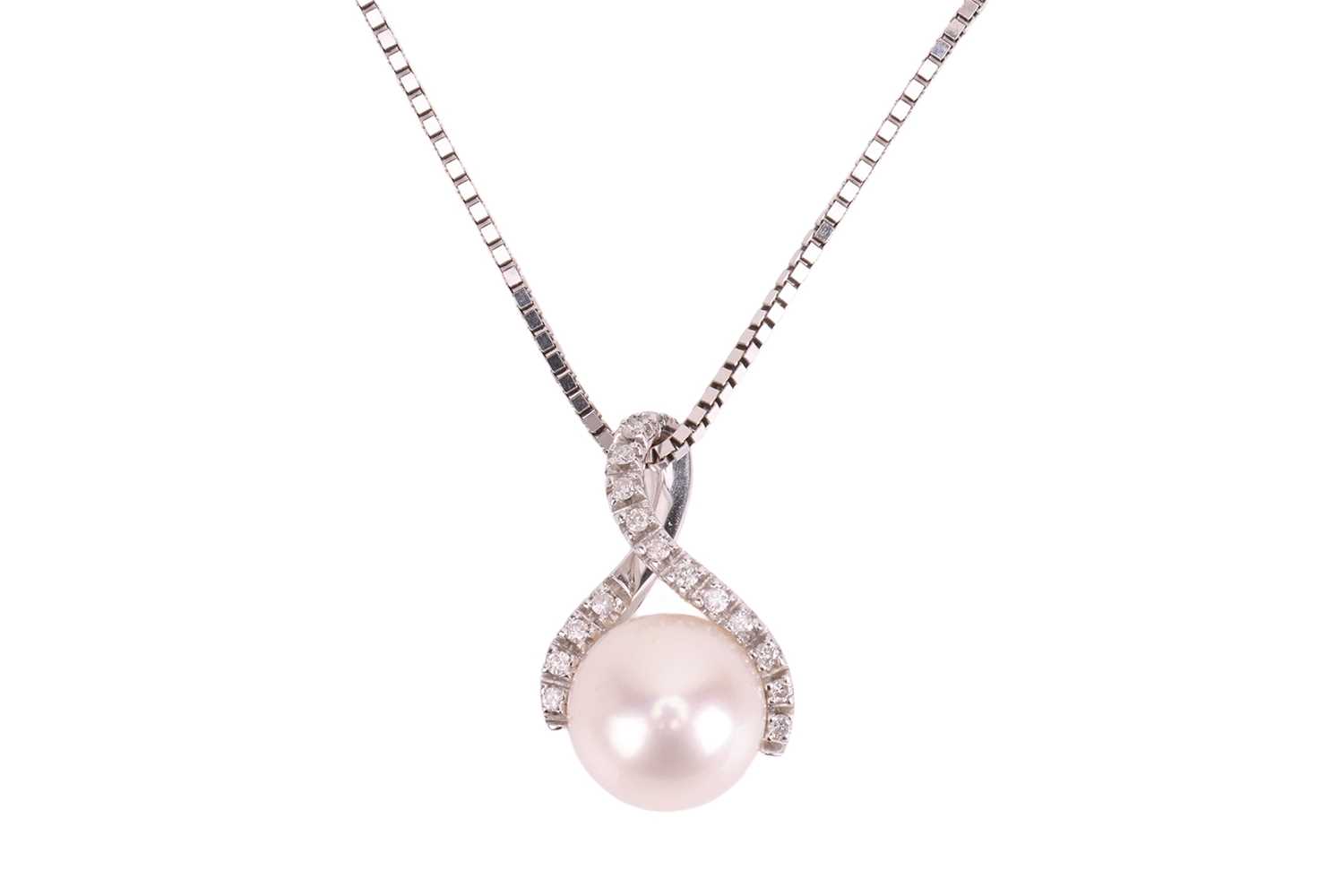Lot A pearl and diamond pendant and chain, the...