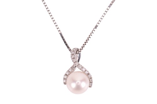 Lot A pearl and diamond pendant and chain, the...