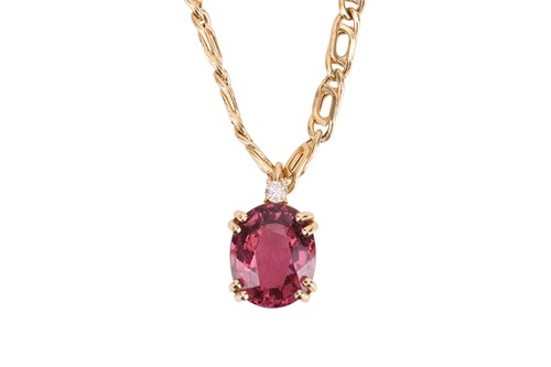 Lot 114 - A tourmaline and diamond pendant and chain,...