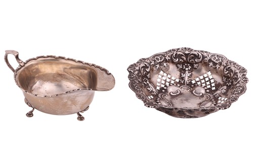 Lot 178 - A Mappin & Webb silver sauceboat, with a...