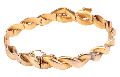 Lot A gem-set double snake head bracelet, hinged...