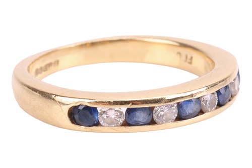Lot A sapphire and diamond half eternity ring,...