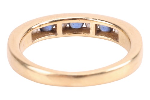 Lot A sapphire and diamond half eternity ring,...