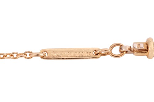 Lot Cartier - An 18ct gold diamond-set cross...