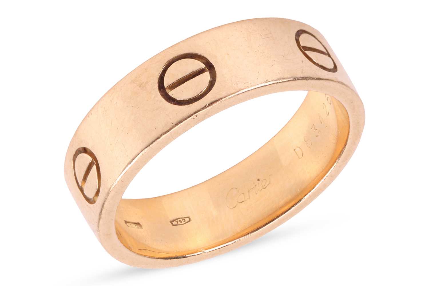 Lot 177 - Cartier - A 'Love' ring in 18ct yellow gold,...