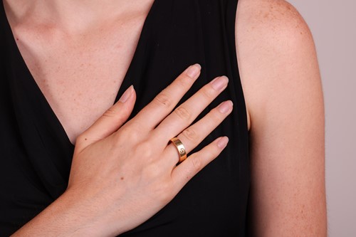 Lot 177 - Cartier - A 'Love' ring in 18ct yellow gold,...