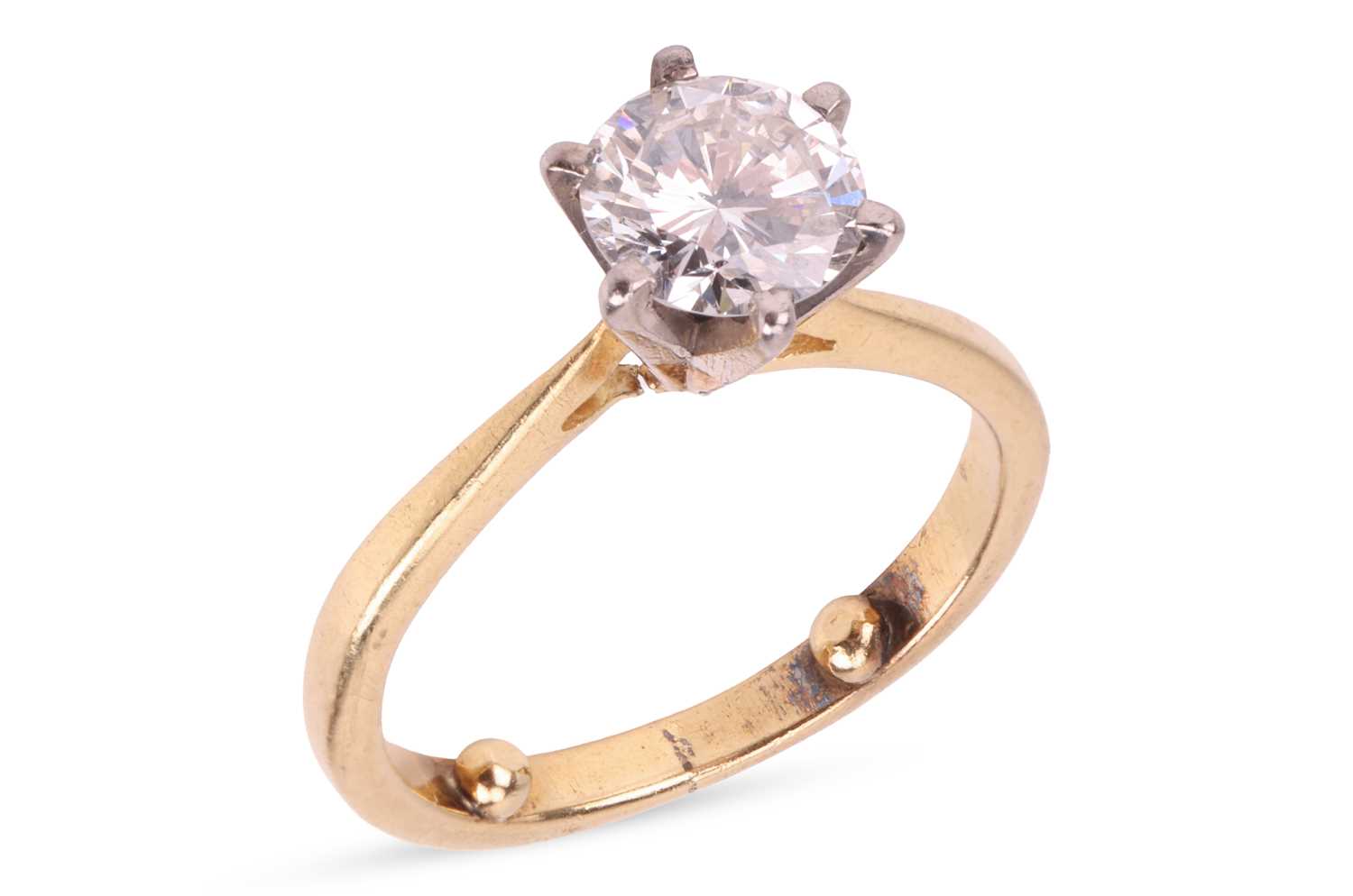 Lot 113 - A diamond solitaire ring, featuring a round...