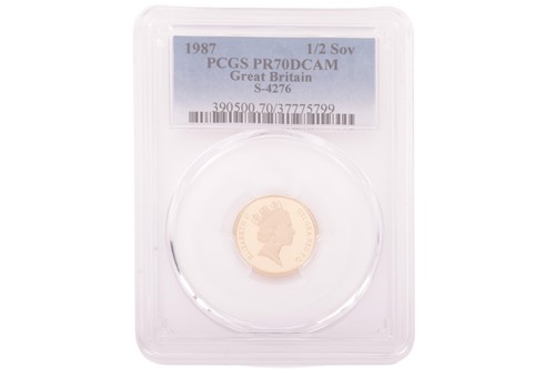 Lot 125 - An Elizabeth II 1987 Half Sovereign, crowned...