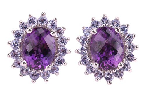 Lot A pair of amethyst and tanzanite cluster...