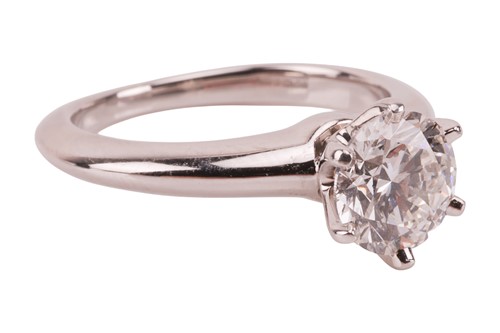 Lot 170 - Tiffany & Co. - A diamond solitaire ring,...