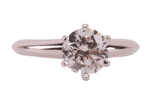 Lot 170 - Tiffany & Co. - A diamond solitaire ring,...