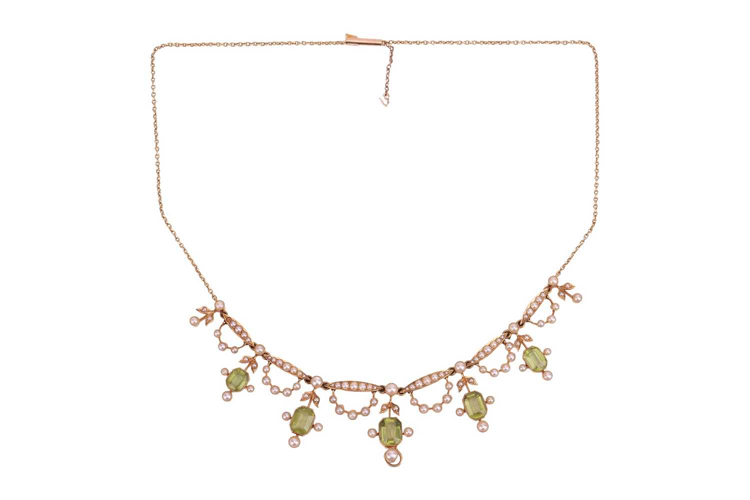 Lot An Edwardian peridot and seed pearl fringe...