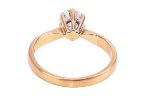 Lot A diamond solitaire ring, featuring a claw-set...