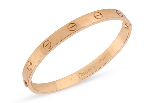 Lot Cartier - a 'LOVE' bangle, composed of two...