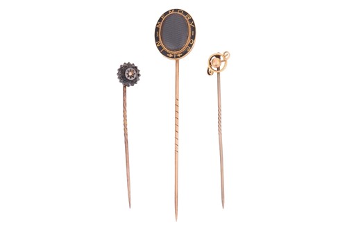 Lot 5 - Three stick pins; The first a gem-set stick...