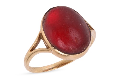 Lot 45 - A paste cabochon dress ring, collet-set with...