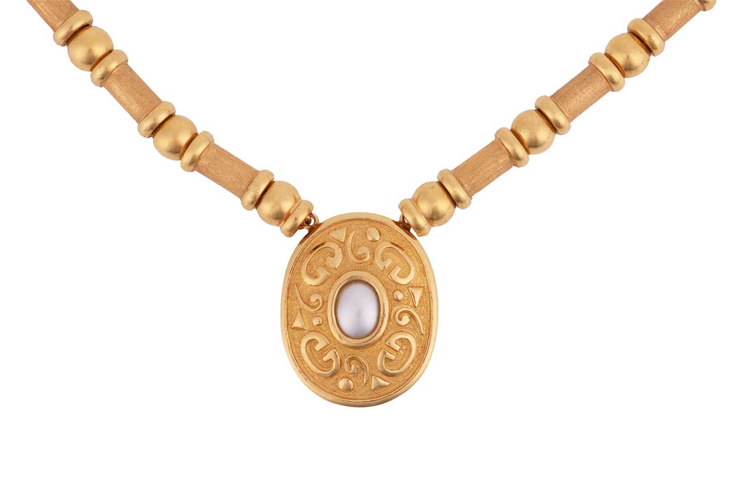 Lot 92 - A pearl-set pendant necklace, the central...