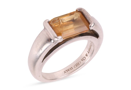 Lot 25 - Tiffany & Co. - A citrine dress ring,...