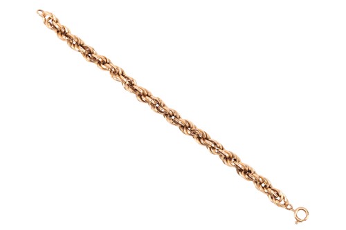 Lot 77 - A twisted rope link bracelet, comprising a...