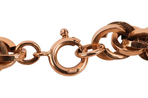 Lot 77 - A twisted rope link bracelet, comprising a...