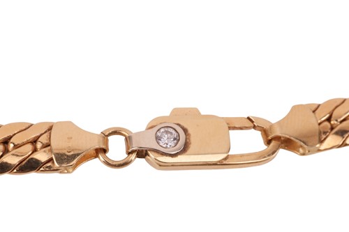 Lot 110 - A curb link necklace; featuring a series of...