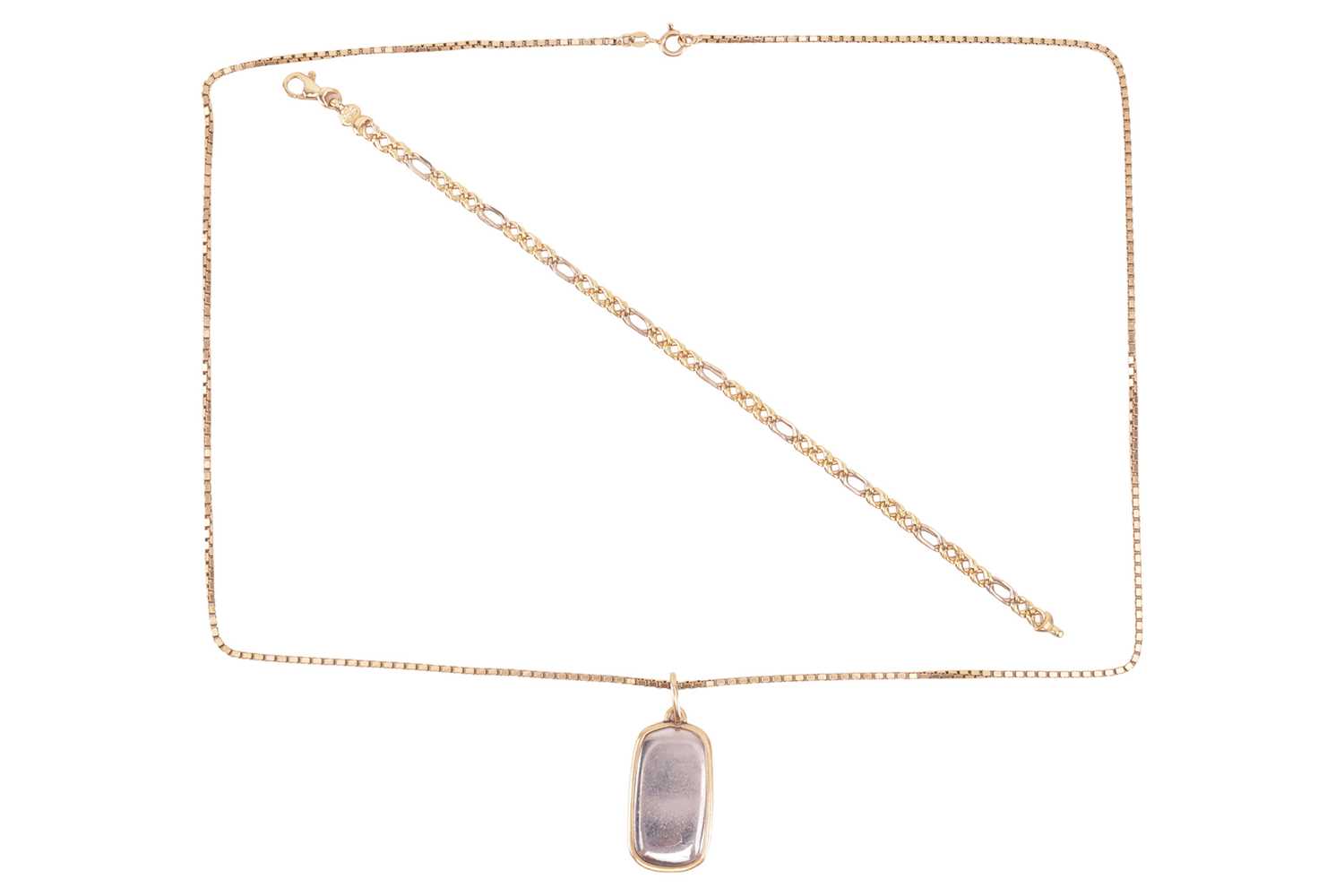 Lot 36 - A two-toned pendant on chain, together with a...