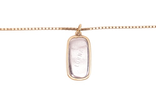 Lot 36 - A two-toned pendant on chain, together with a...
