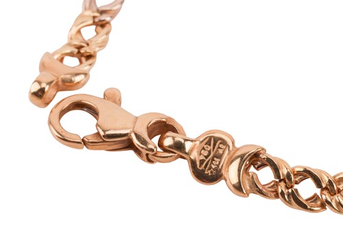 Lot 36 - A two-toned pendant on chain, together with a...