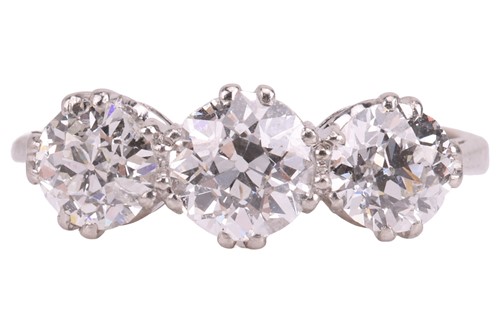 Lot An old-European cut diamond trilogy ring,...