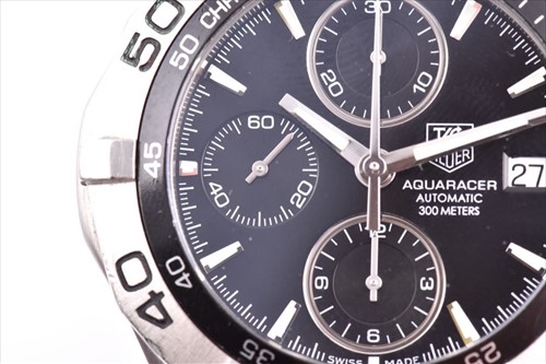 Lot 355 - A Tag Heuer 2000 Series Aquaracer stainless...