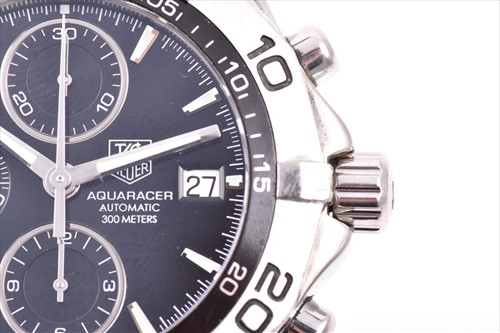 Lot 355 - A Tag Heuer 2000 Series Aquaracer stainless...