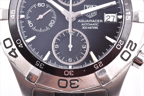 Lot 355 - A Tag Heuer 2000 Series Aquaracer stainless...