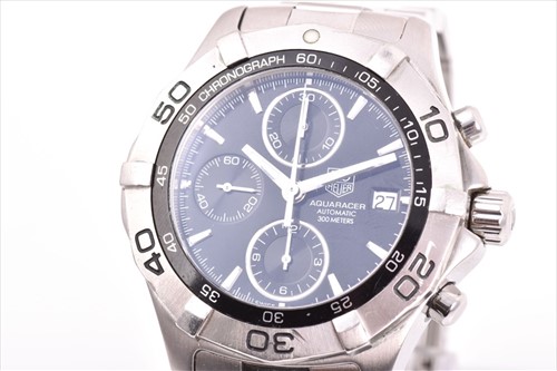 Lot 355 - A Tag Heuer 2000 Series Aquaracer stainless...