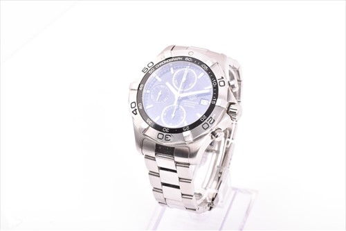 Lot 355 - A Tag Heuer 2000 Series Aquaracer stainless...