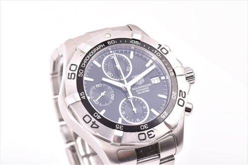 Lot 355 - A Tag Heuer 2000 Series Aquaracer stainless...