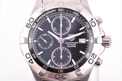 Lot 355 - A Tag Heuer 2000 Series Aquaracer stainless...
