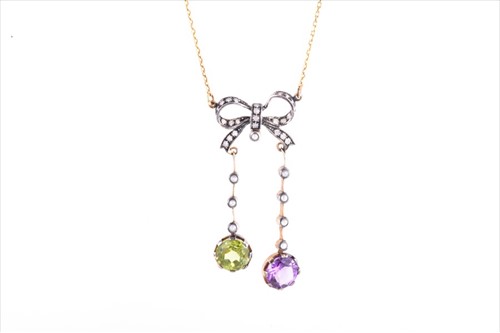 Lot 666 - A silver gilt, diamond, peridot and amethyst...