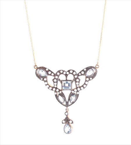 Lot 572 - A silver gilt, blue topaz, and pearl pendant...